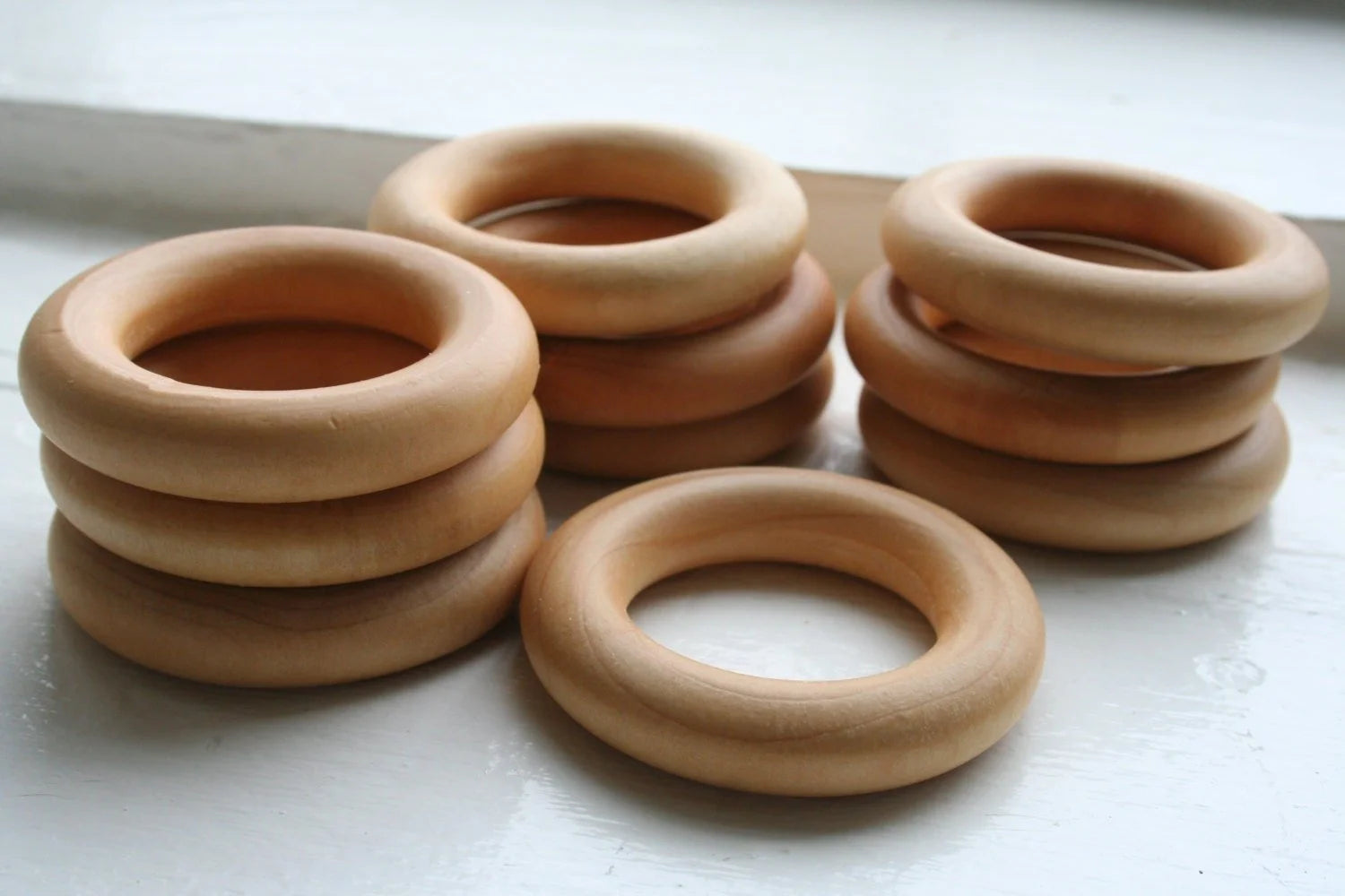 10 Wooden Rings - Essential Montessori